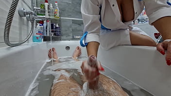 FAMILY FANTASY - A nurse jerks off a man'_s cock in the bathroom