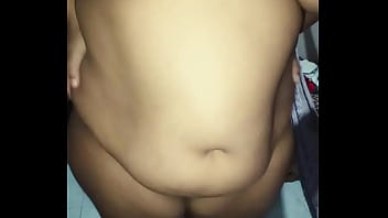 Naked woman exercising on body shaker | 1