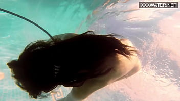 Amelie Bruna tasty brunette with big tits in the pool