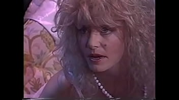 Lecherous blonde bean flicker with big melons in white lingerie asked her dyke girlfriend Sharon Kane sbout romantic night and she was rewarded with anal dildo drilling and strap-on pussy pounding at one time