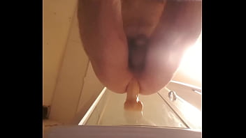 Googleaap with big dildo shaking it in