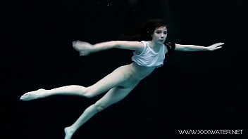 Andrejka swims naked in the pool