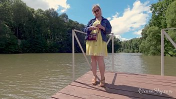 Buttpluged slut in a nature park