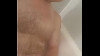 Young guy jacks off in shower
