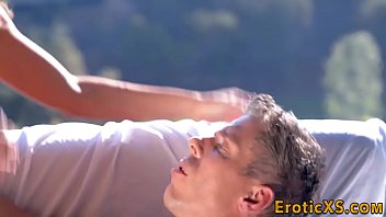 Busty babe rides lover outdoors