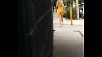 CANDID super sexy blonde walking down the street in a sexy yellow dress