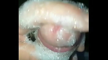 Slow mo washing cock in shower
