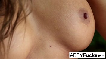 Abigail Mac takes a nice shower outside in the woods