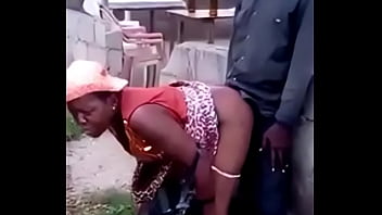 African woman fucks her man in public