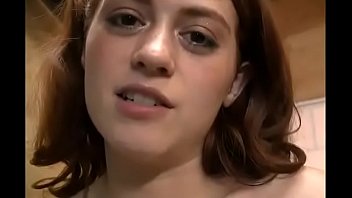 Alice Green, Cute redhead gives a handjob and recieves a facial with a big smile.