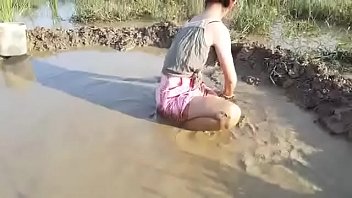Beauty girl  Catching Fish By hand