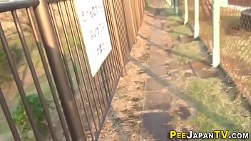 Asian relieves herself