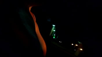 Riding around flashing my boobs at night