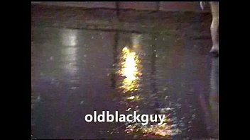 oldblackguy and gloria singing in the rain shower