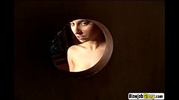 Shy brunette visits glory hole and sucks big cock