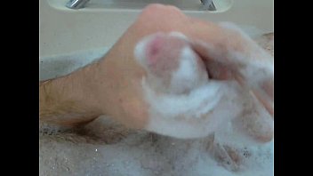 Mature guy cumming in the bathtub