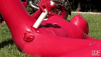 Busty babe toying in full latexwear