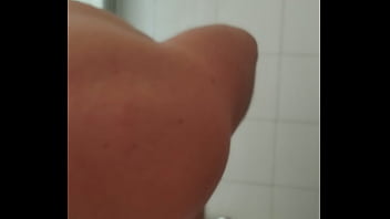 Big dick male shaving his penis