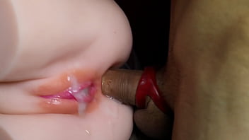 A sexy bald vagina is abundantly filled with fresh sperm and sperm flows over the plump labia close-up