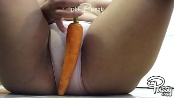 Carrot in pussy close-up