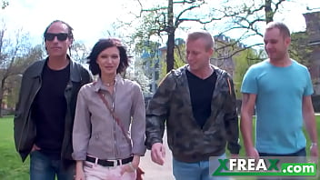 Ukrainian girl Lina Arian gets warmed up in a park and taken home by 3 guys for a gang bang