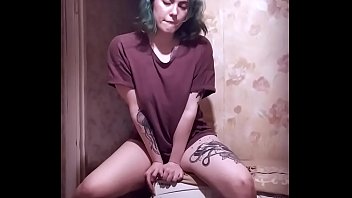 Teen girl loves to have fun on the washing machine