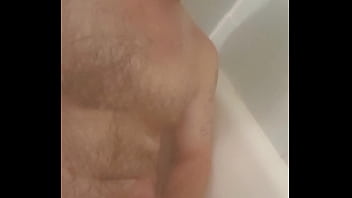 Young guy jacks off in shower