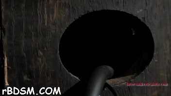 Beauty wears an metallic helmet during hardcore snatch drilling