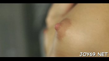 Sweet teen angel plays with a toy