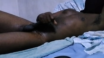 HORNY BLACK MALE HUGE CUMSHOT WHILE WATCHING PORN