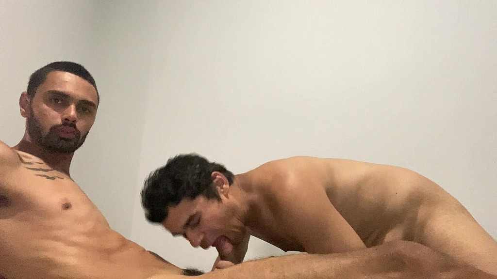 two guys sucking each other