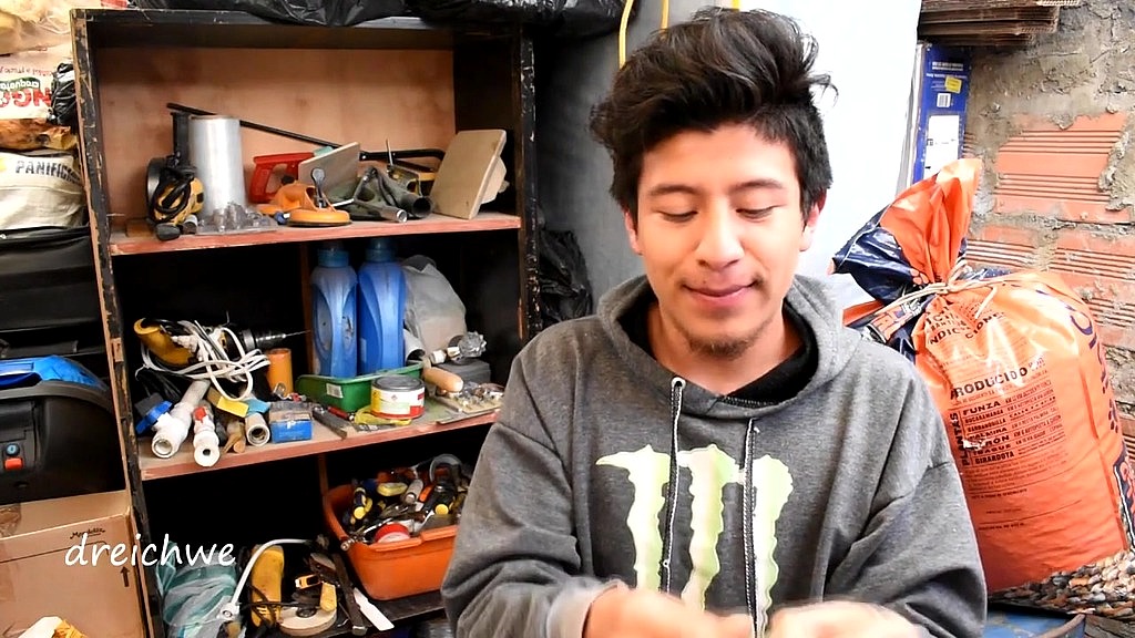 in a cellar inflating condoms