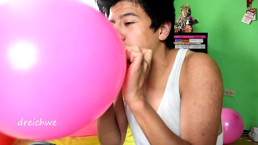 blowing up balloons