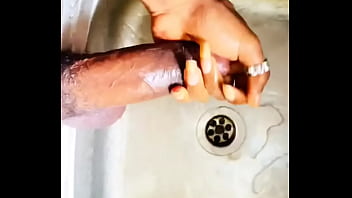 Washing my BBC in the kitchen sink before washing the plates. FULL CUM VIDEO IN RED. Who wants my Dick?