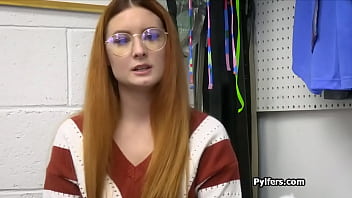 Nerdy redhead in glasses milks officers hard dick