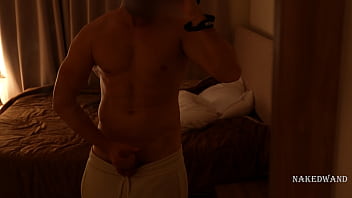 Fit guy in pants jerking his cock