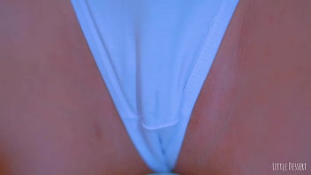 Sexy Latin girl shows off her big round ass in a white thong under a blue dress