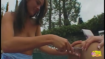 Big nipples get very hard as a lesbian pinches them and cums