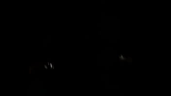 CD Janita walks outside @night