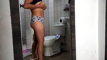 The boss&#039_s stepdaughter records herself in the bathroom undressing.