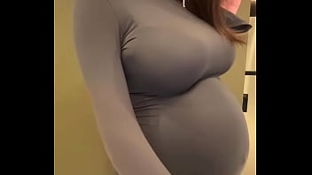 Pregnant stepmother with big milky tits in a tight dress