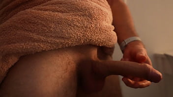 Sexy guy having fun alone in a hotel room