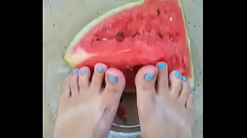 cute feet smashing watermelon