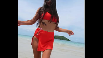 Orange sexy bikini fun on the tropical beach