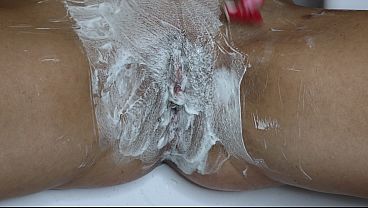 Shaving a pussy with a trimmer and a razor! Closeup!