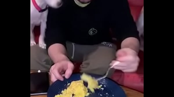 Guy eating eggs