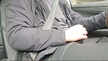 Stroking cock while driving