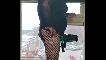 i cum quick using a masturbation machine and dressed like a sissy in the window where public could see me from outside