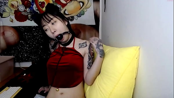 Kinky asian catgirl slaps her round ass and wears ballgag
