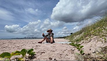 Milf flashing hairy pussy on public beach